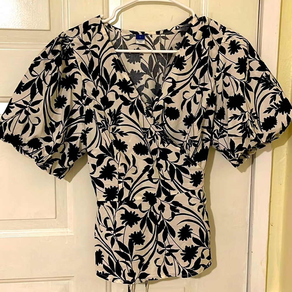 Blue and white top with design